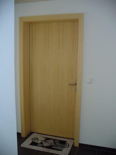 Futtertüre in Fichtenholz, mit Verkleidungen
